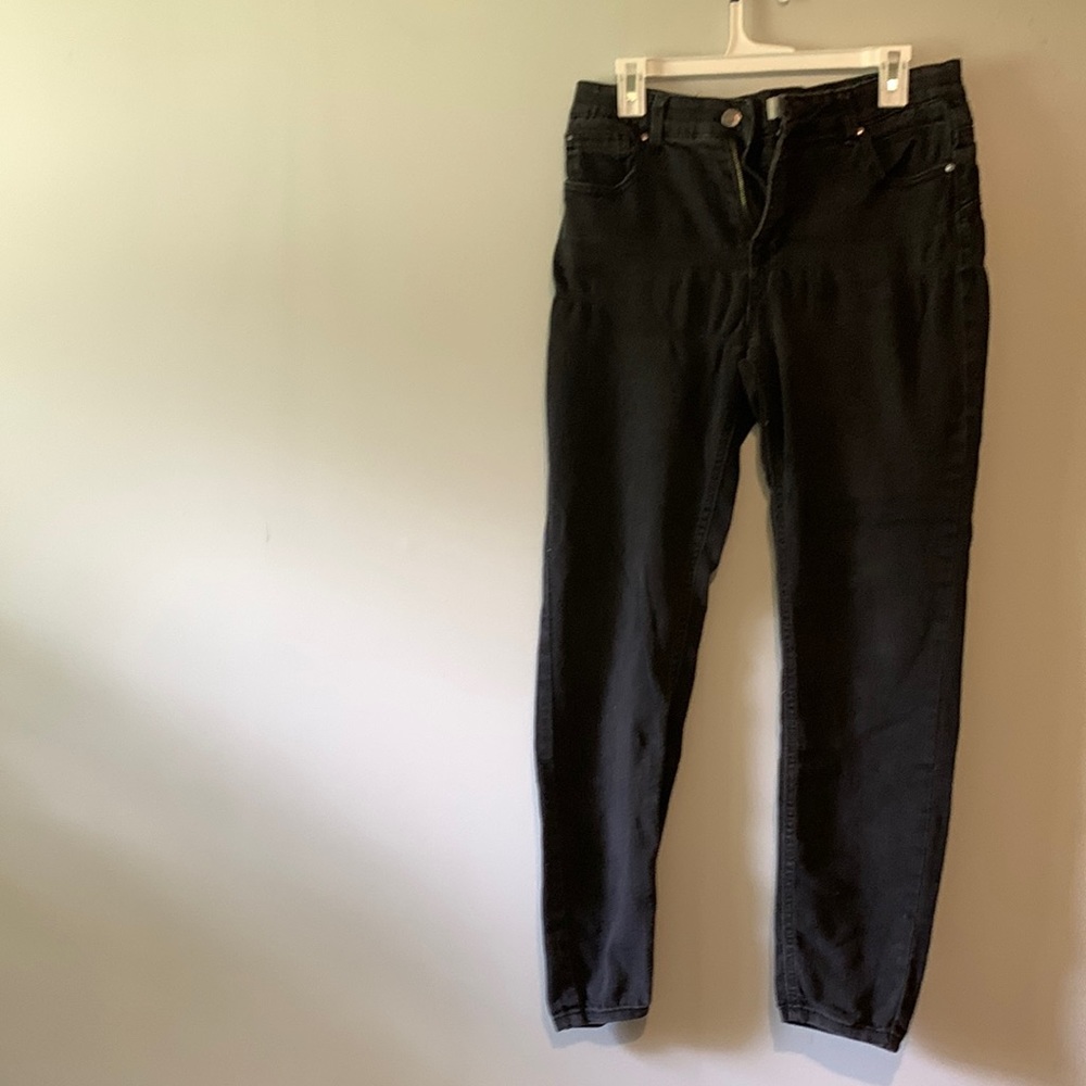 Size 14 faded black slimming jeans.